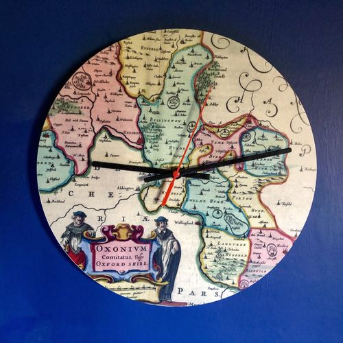 Clock customizable with antique map
